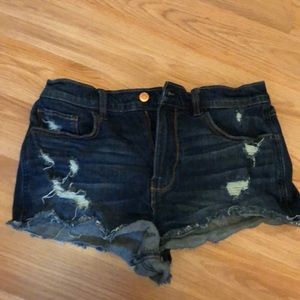 Mid rise, dark wash jean shorts